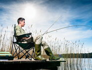 Angler auf Steg