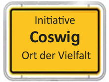 Ortsschild mit Aufschrift "Initiative Coswig- Ort der Vielfalt"